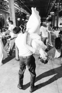 This is the bride and groom first dance flip at their wedding reception at the Carriage House at Park Crest Events in Hoover, Alabama taken by Alabama Weddings